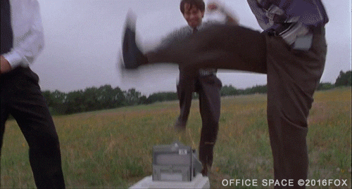 Office Space Gif with legs kicking a printer